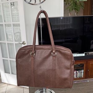 5/$20 Dark brown vegan snakeskin attaché with light padding and wipeable lining